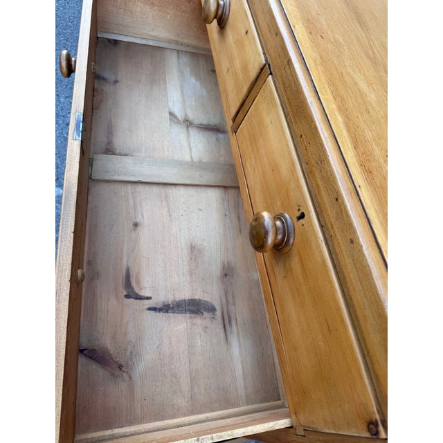 This is a lovely antique pine chest! This piece dates to the 19th century and has lovely patina. The wood has a warm glow,...