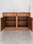 Very pretty antique carved sideboard in burled wood with two drawers (one divided) on top and two cabinets below. Brass...