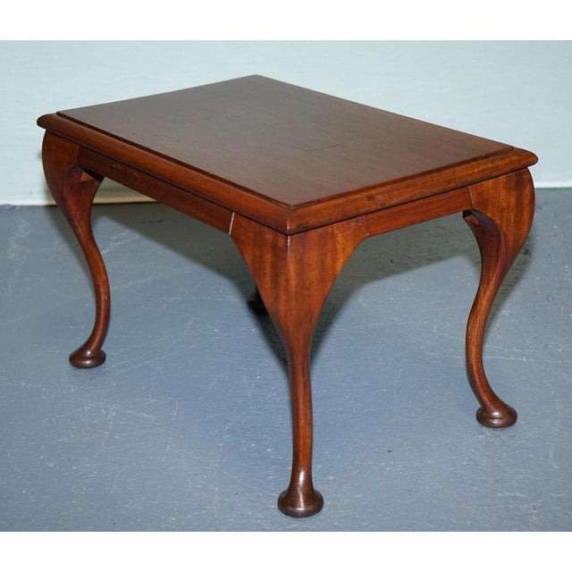 Antiques of London A charming vintage Queen Anne style low table crafted from mahogany, featuring a rectangular top with a...