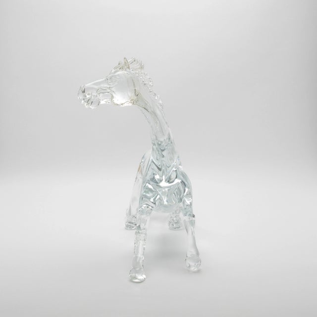 Crafted from the purest hand-blown Murano glass, this exceptional horse sculpture is a pinnacle of luxury artistry and...