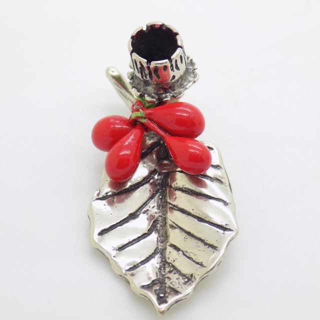 A vintage Italian Christmas candle holder miniature, handcrafted in Italy during the 1970s/1980s in Continental Silver...