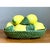 This trompe l'oeil centerpiece presents a generous mound of sculpted ceramic lemons, each rendered with convincing...