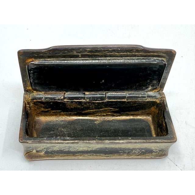 A lovely little group of three Victorian Match safes and little trinket boxes. One is horn with silver inlay. It opens...