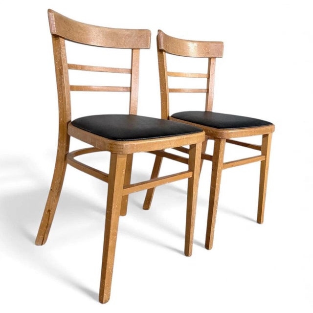Vintage beech dining chairs bring timeless style and comfort to your home with their solid beech wood construction and...