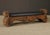 Striking vintage carved bench by Witco, a maker well known for its bold Polynesian and tiki-inspired furniture during the...