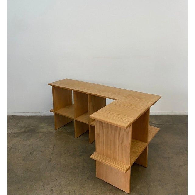 W59 D33.5 H27 This is our floor model, still available now, made in white oak with solid and veneer wood elements. This...