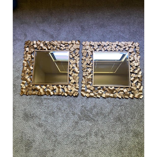 These two Contemporary Gold Metal Wall Mirror in the 'capulin' style mimicking Horchow is a modern and stylish addition to...