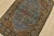 An authentic vintage traditional Qom rug hand-knotted with fine wool and natural dyes. This intricate woven rug features a...