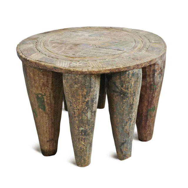 Vintage Nupe tribal stool from Nigeria. Eight legs and carved from one solid piece of indigenous wood. Beautiful patina...