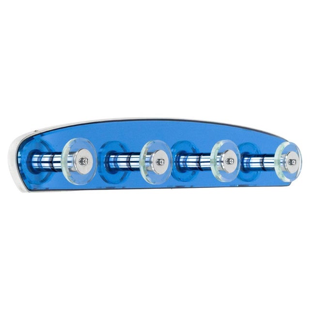 Midcentury beautiful coat rack in blue glass and chrome with four circular hooks in glass in the style of Cristal Arte....