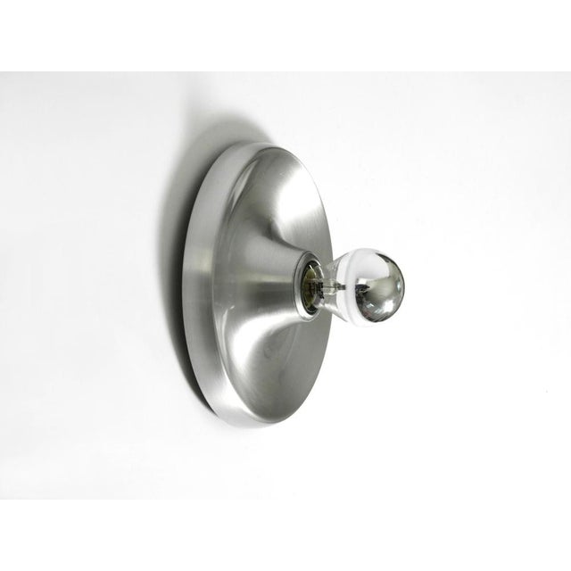 Minimalist 1960s Space Age Pop Art aluminum ceiling or wall lamp. The front of the lamp are covered with glossy clear...
