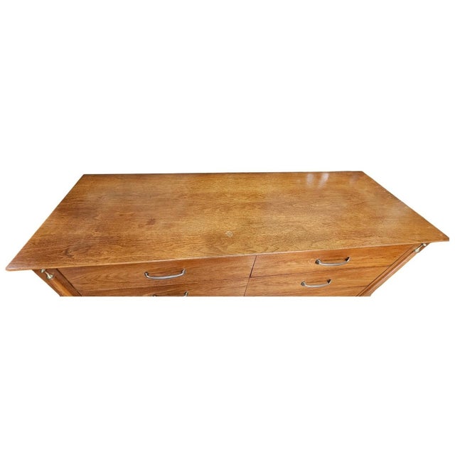 Measurements: • Dresser Height: 32" • Dresser Width: 58" • Dresser Depth: 19" • Nightstand Height: 23" • Nightstand Width:...