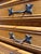 Add classic French style to any space with this lovely, compact 20th-century oak chest of drawers. Crafted with a warm,...