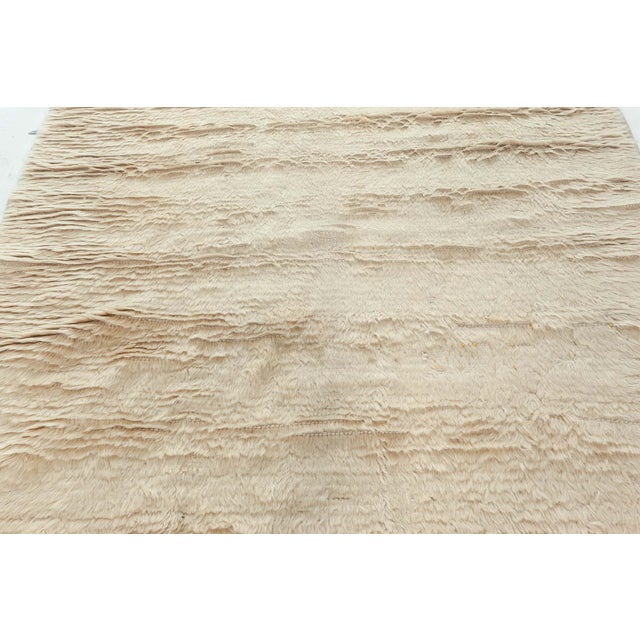 Vintage Tulu Rug Size: 4'4" × 4'6" (132 × 137 cm) Experience the plush luxury of this vintage Tulu Moroccan rug, measuring...
