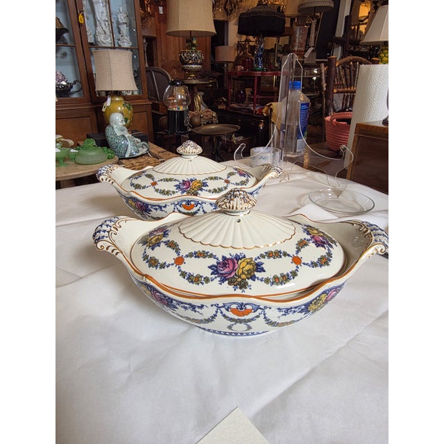 Pair of antique English Wedgwood Tureens in the Grosvenor pattern.