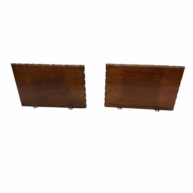 Vintage wood carved regency style decorative wall brackets. Measures 9.5” w x 6.25” d x 10.5” h.