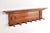 Beautiful wall-mounted coat rack from around 1890. This oak coat rack is finely crafted, features intricate detailing, and...