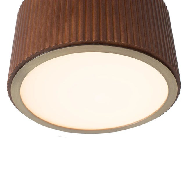 Discover the Tambo Semi-Flush Mount ceiling light, a beacon of modern elegance that seamlessly blends hand-laid dark...