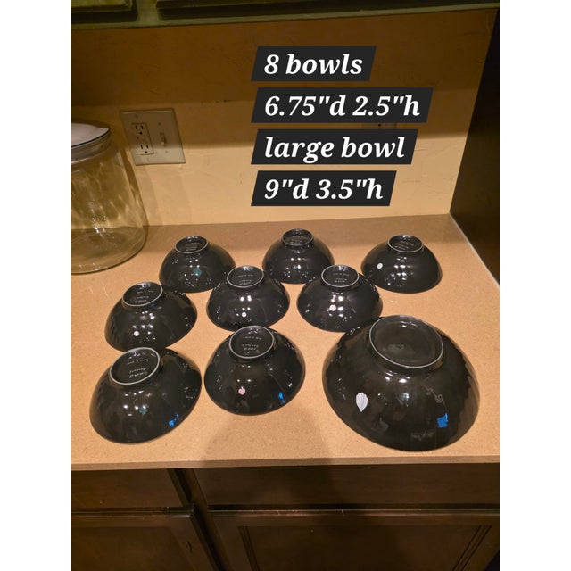 Unique set of 8 regular size bowls and one large bowl. Each one hand decorated and signed and dated 2010.