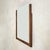 A French Art Deco wall mirror from the 1930s, framed in richly toned mahogany. Stepped side uprights and chamfered corners...