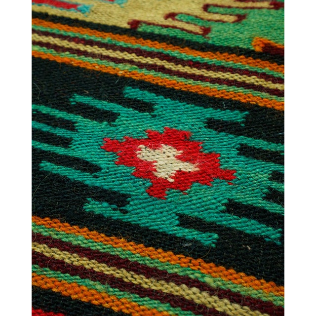 Handwoven Romanian folk flatweave wool rug (kilim-style), featuring a bold banded geometric design and vivid palette...