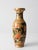 A mid-century Chinese porcelain vase richly decorated with phoenix birds, peonies, and layered floral borders in black,...