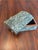 A vintage lidded decorative box made in the Philippines, its rectangular form and gently domed lid carried by a high-gloss...