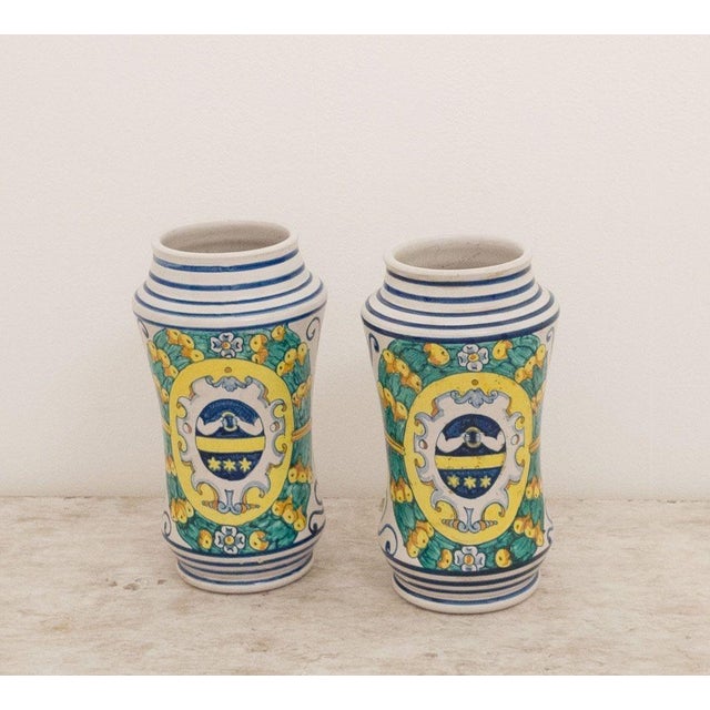 A pair of vintage apothecary jugs in the 17th-century style.