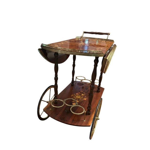 A gorgeous Italian burlwood marquetry bar/tea cart by master Italian artisans, Sorrento, during the 1950s-1960s. Sorrento...