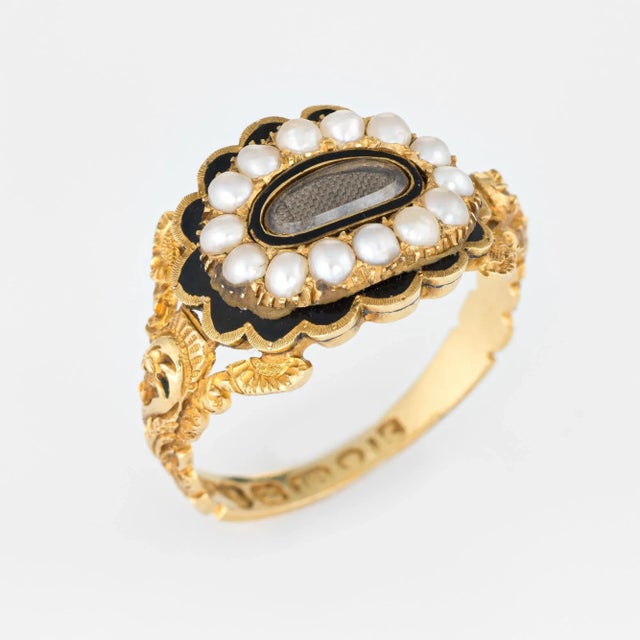Antique Georgian era memorial ring (circa 1825) crafted in 18 karat yellow gold. Natural pearls measuring (average) 2.5mm...