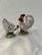 Charming pair of mid-century rooster and hen ceramic salt and pepper shakers with plastic stoppers. Dimensions: rooster,...