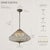 Gracefully aged and artfully finished, this vintage crystal chandelier features a unique antique bronze tone with a...