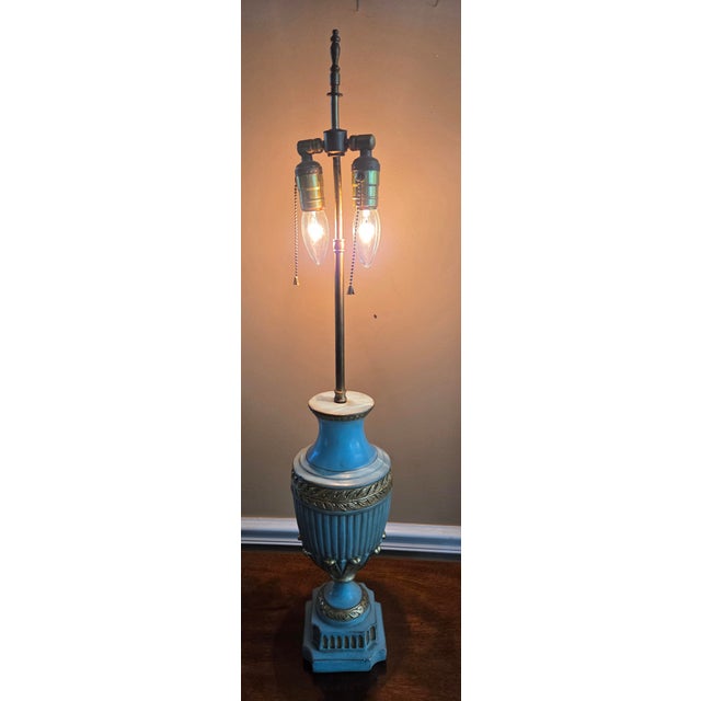 This lovely ceramic table lamp is formed as a classical urn with acanthus leaf border in gold leaf. An elegant addition to...