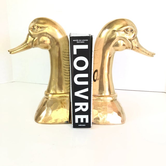 Timelessly elegant polished brass mother goose bookends, Substantial in size and impact. Stamped "Made in Spain" Want to...