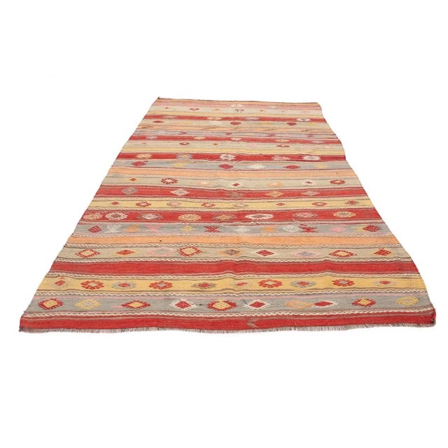 Vintage handwoven decorative kilim rug from Denizli region of Turkey. Approximately 50-60 years old. In very good condition.