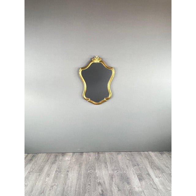 Rococo Style Mirror – 20th Century Charming Rococo style wall mirror, made in the 20th century. Gilt wood frame with...