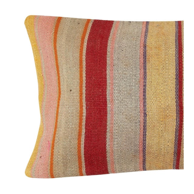 Add a touch of history and warmth to your space with this vintage handmade Turkish wool kilim cushion cover. Crafted from...