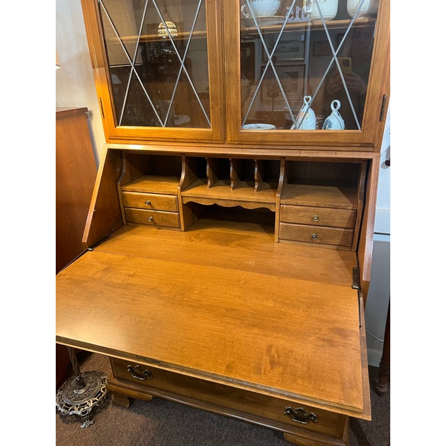 Beautiful Chippendale Early American Style chest of drawers with drop front secretary desk and bookcase/china cabinet...
