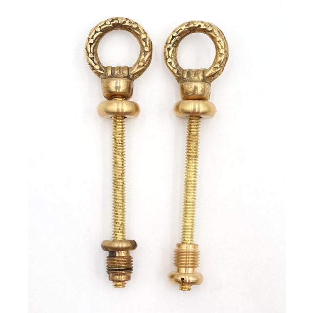 Traditional style mirror screws made of polished brass. Good condition with surface wear from prior use. Priced per pair....