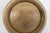 This Decorative Plate is made out of brass. This lovely small plate features a rounded shape, engraved floral details to...