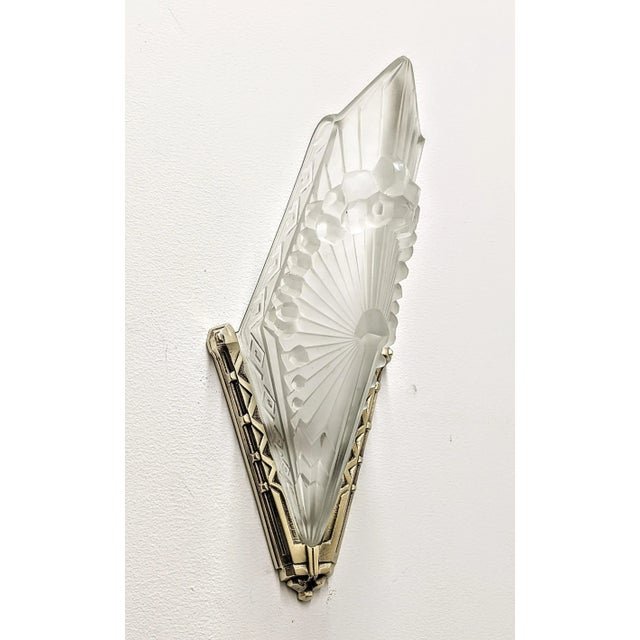 Stunning pair of French Art Deco sconces were created by the French artist " Charles Schneider " in great condition. Each...