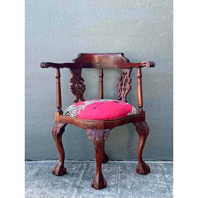This striking vintage corner chair is a masterful blend of traditional English furniture design and contemporary...