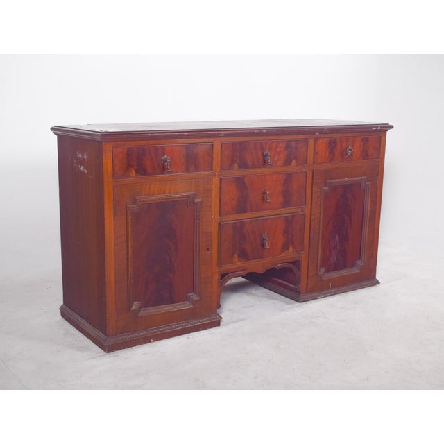 English sideboard with two doors and five drawers. with its sober and elegant lines, probably from the late 19th or early...