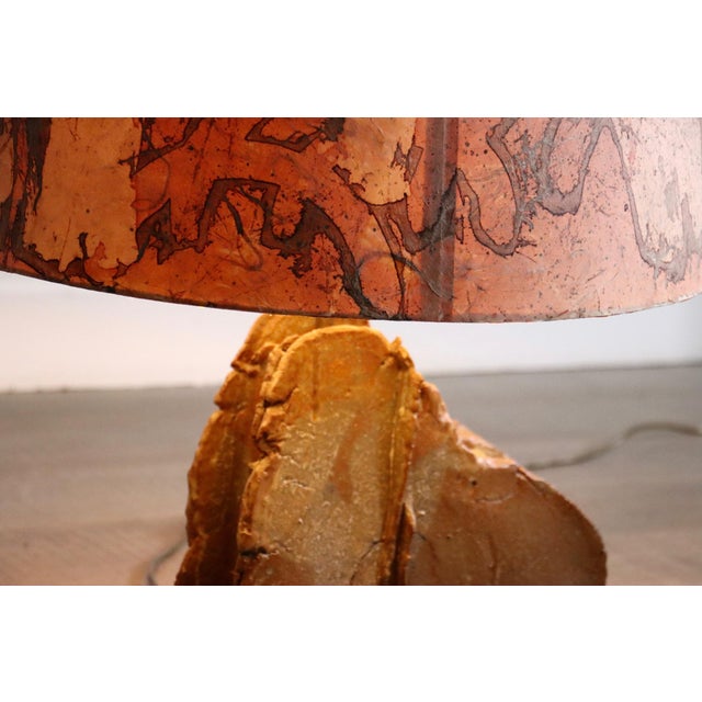 Stunning sculptural ceramic table lamp by Marianne Koplin, Germany, 1970s. This incredible table lamp reflects the warm...