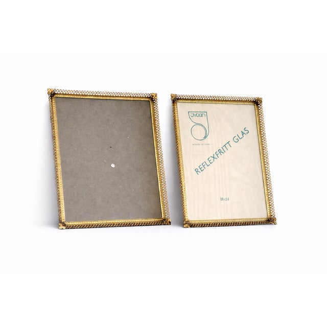 Pair of Danish gilt brass picture frames by Jyden (Rammefabriken Jyden), produced circa 1960s in Denmark. The frames...