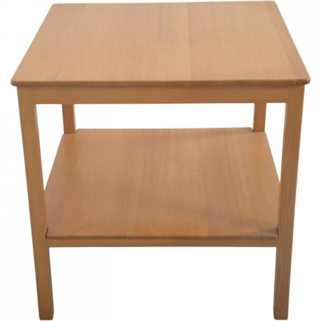 Kaare Klint sidetable with a wooden frame, made of lacquered elm. The table is from the 1970s and appears in good...
