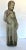 Vintage concrete statue of beloved Saint Francis of Assisi. Known for love of animals, there is a bird in one hand and a...