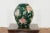 A vintage Chinese handcrafted green vase from the mid-20th century, with incised floral and bird decor. Created in China...