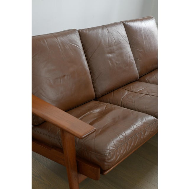 Beautiful Mid-Century model GE 290/3 sofa designed by Hans J. Wegner and produced in 1953 by Getama in Denmark. Sofa is in...