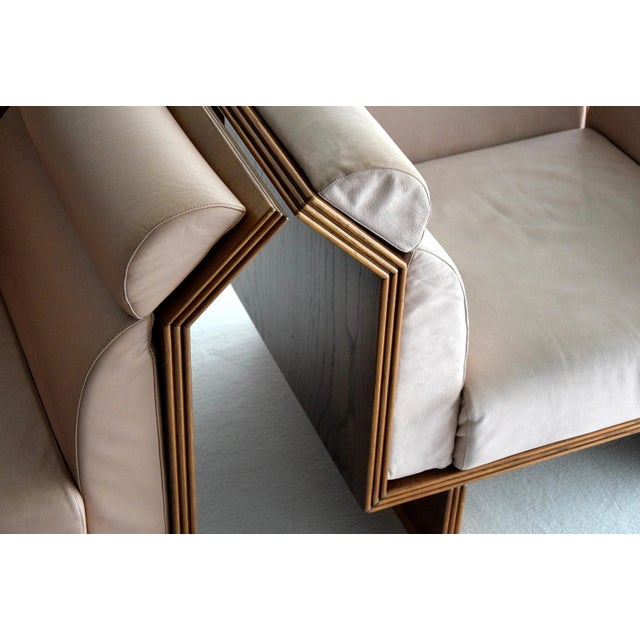 This is a pair of Poltrona Pretenziosa lounge chairs by Ugo La Pietra for Busnelli, 1983. The model was part of a research...